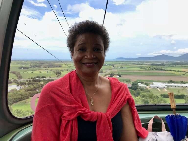 Molly from Mollywozhere travel blog showing the view from the Skyrail Rainforest Cable car in Kuranda, Australia.