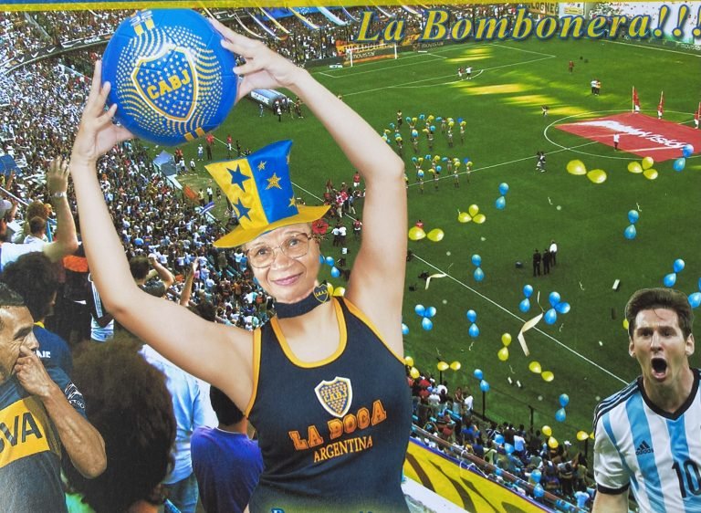 Molly from Mollywozhere travel blog in a fun photo with a football.