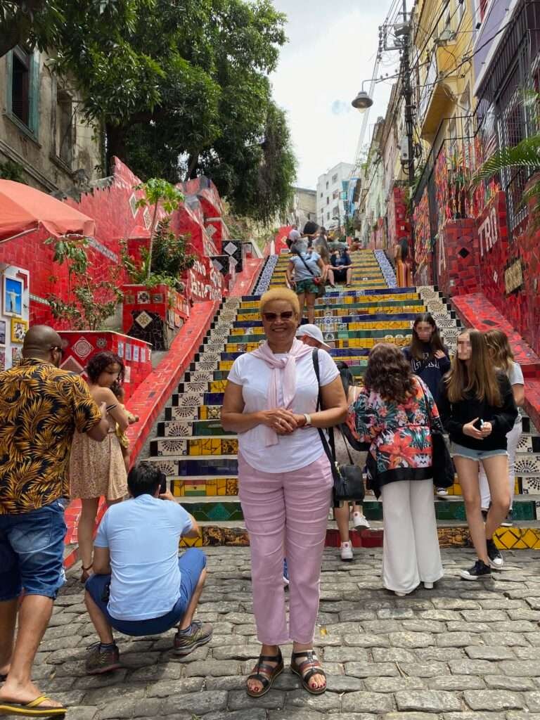 Molly from Mollywozhere travel blog standing on the Selarón Steps, Rio de Janerio.