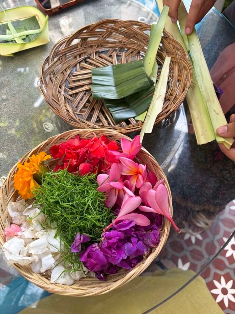 Colourful flowers in Canang Sari for daily offering in Bali, Indonesia