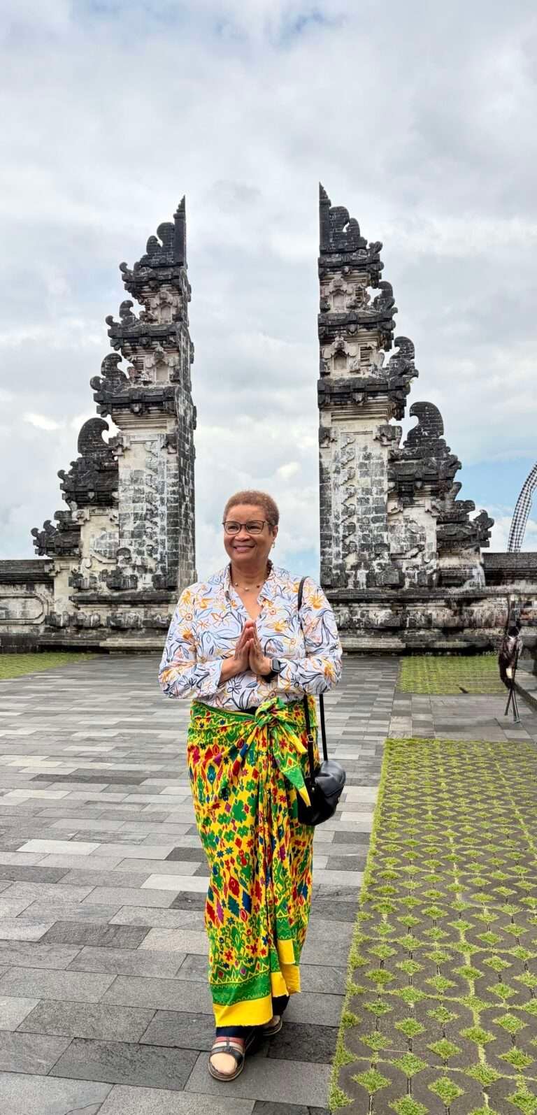 Molly from Mollywozhere travel blog standing in front of the gates in Lempuyang Temple, Bali.