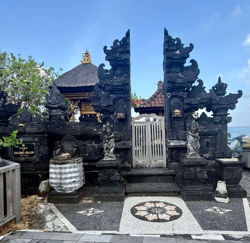 Molly from Mollywozhere travel blog looking at Pura Enjung Galuh temple in Tanah Lot, Bali.